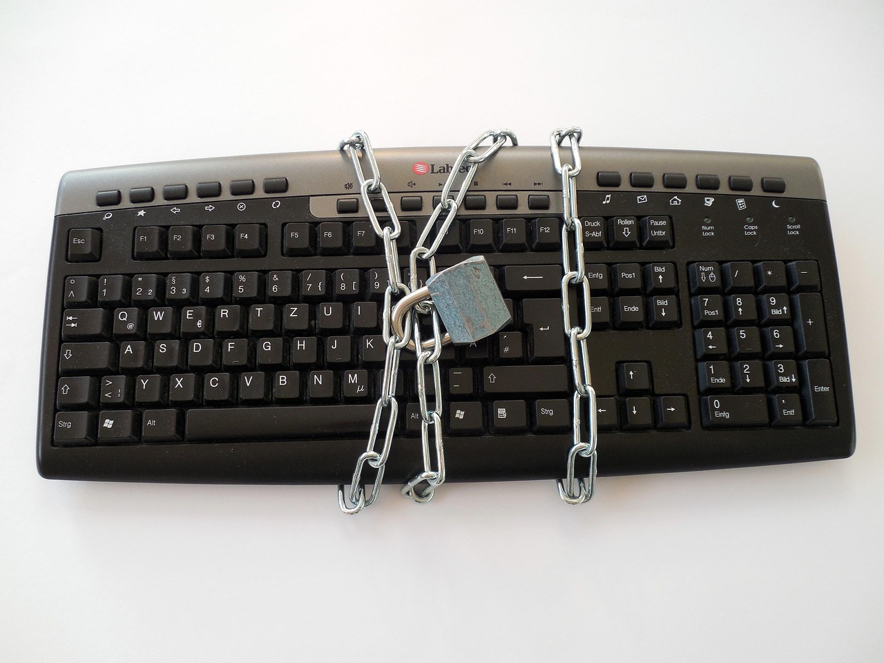 A keyboard secured with a padlock and chain