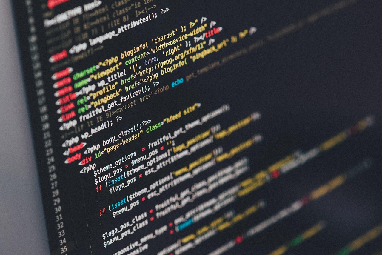 Colorful lines of source code displayed on a dark computer screen