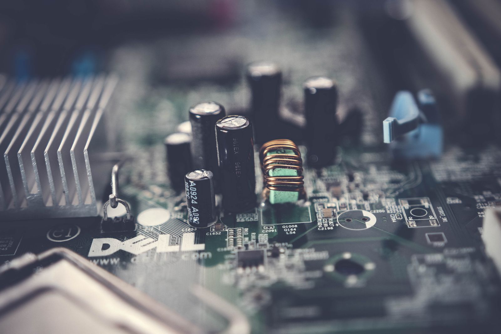 A close-up of a computer motherboard. Secure Boot lives in the UEFI firmware and checks signatures before any operating system code runs.