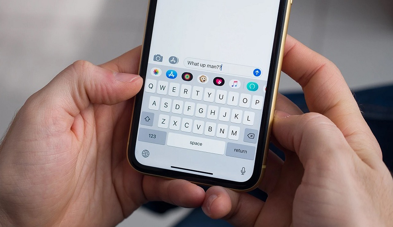 A person holding a smartphone in both hands